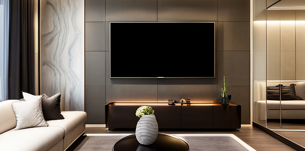 “Modern luxury living room interior with a wall-mounted TV, sleek black entertainment unit, elegant sofa, and minimalist decor by DRR Interiors.”